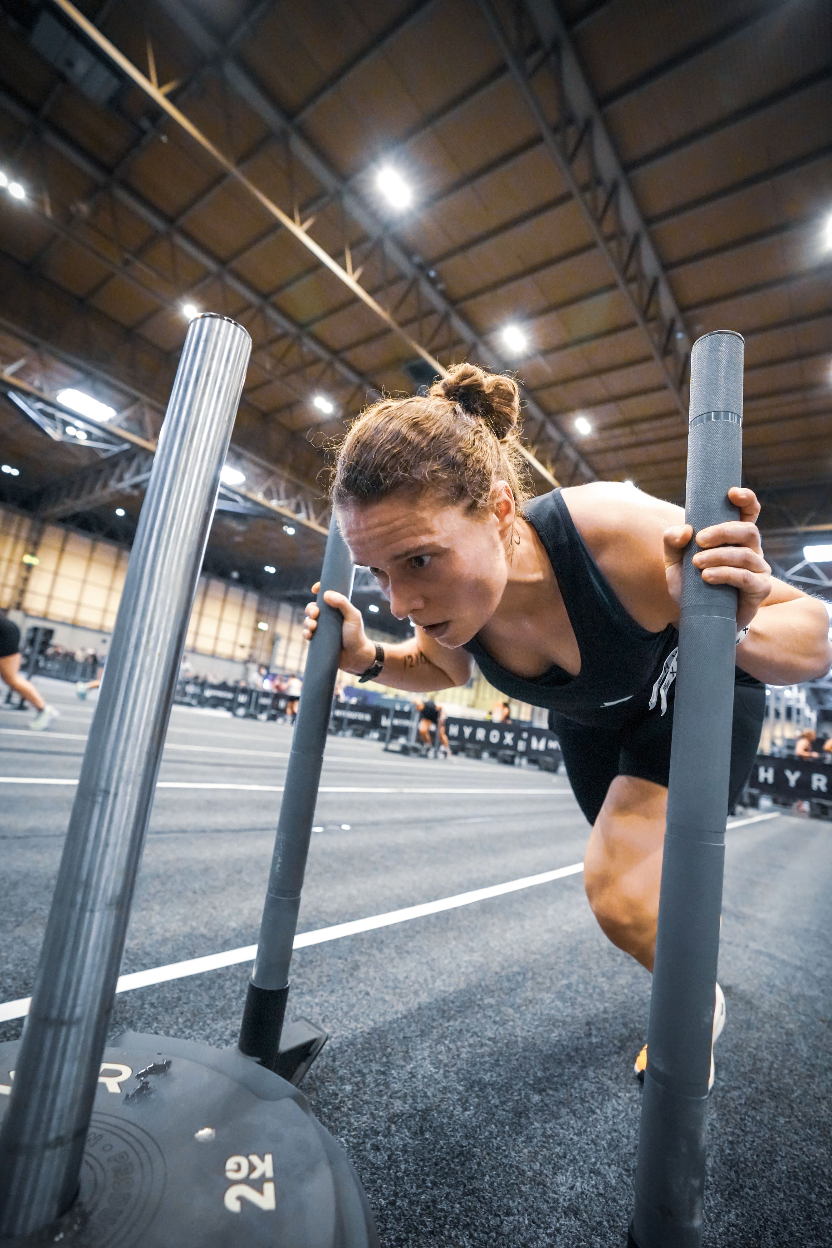 Hyrox sled being pushed with energy gel