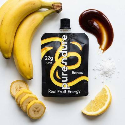 Purendure banana energy pouch with bananas, lemon, and date syrup on a white background