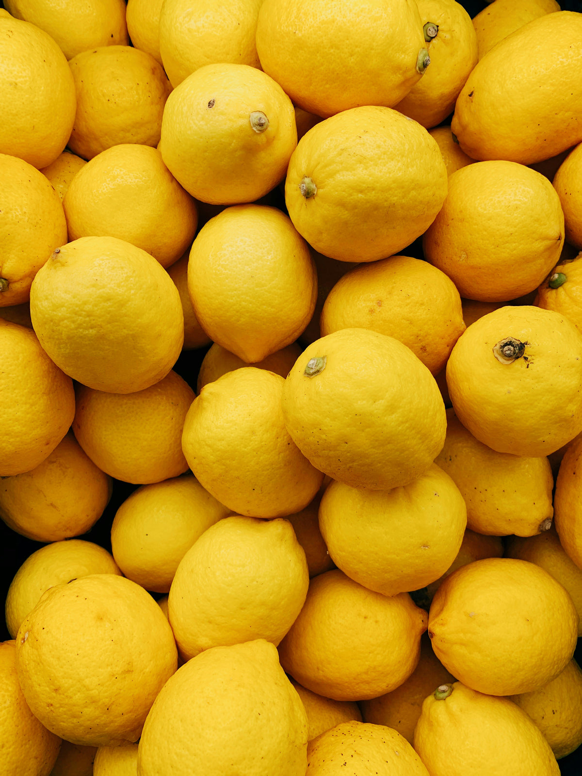 Stack of yellow lemons